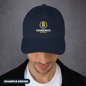 Navy embroidered dad hat with an example Crumbwick Bakery logo (example design)