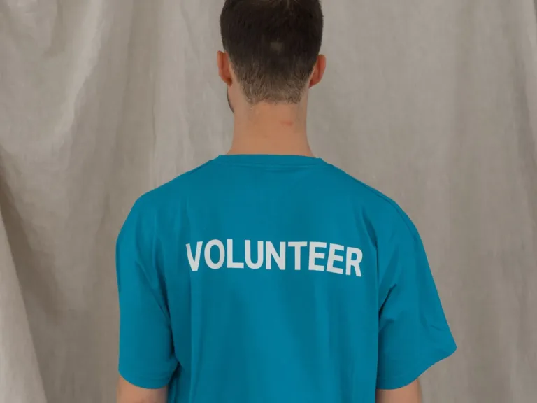 Event volunteer in a printed t-shirt